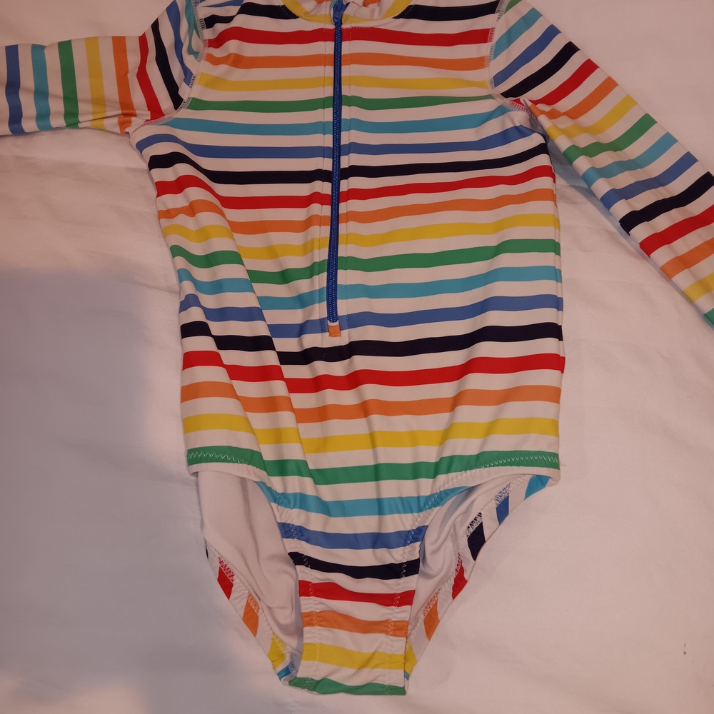 Primary Long sleeve one-piece rash guard in Rainbow Stripe SIZE 4-5